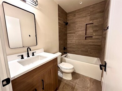 Full bathroom featuring vanity and shower / bath c