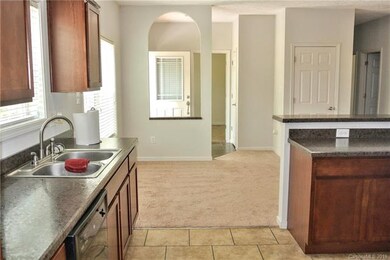 Looking to the foyer from the kitchen