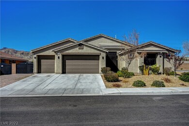 Front, 3-Car Garage and RV Gate