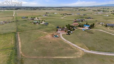 Aerial overview of property's location with rural landscape