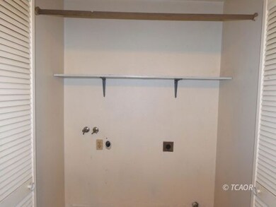 Laundry hook ups in kitchen
