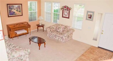 Enter into an open and spacious formal living room