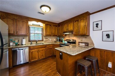 updated kitchen with gorgeous granite counters, ma
