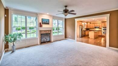 Inviting Family Room Open to the Kitchen with Cust