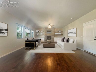 6490 Tranters Creek Way, Colorado Springs, CO 80925 - photo 2