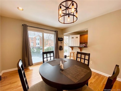 Dinning area with slider door to balcony