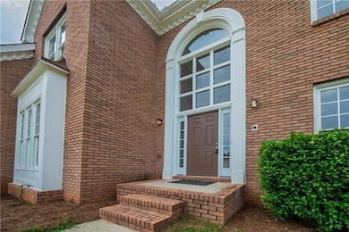 Property entrance with brick siding
