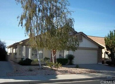 This is the front view of the home looking south, the home faces north. The garage has an auto garage door opener.