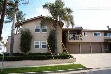 Front and rear units boast 3 bedrooms and 2.5 bathrooms. Middle unit above the garage bays is a sweet 1-bedroom with balcony.