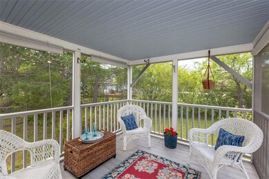 Well loved screened porch looks over...