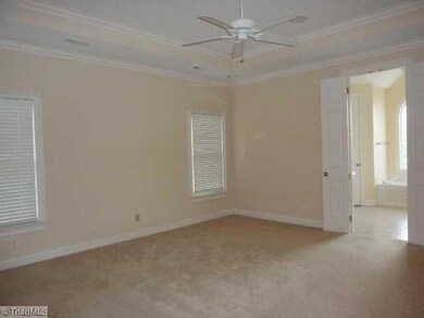 Master Bedroom. Very spacious with boxed trey ceiling and double doors to bath.