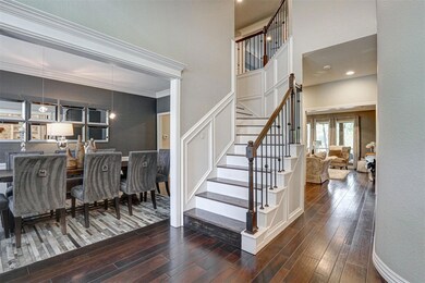 Entryway, Stairs with crown molding, wood finished