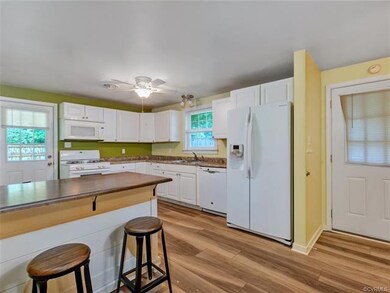Great kitchen space with new refrigerator, gas coo