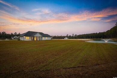 Yard at dusk with a water view