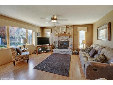 Large open family room with wood burning fireplace