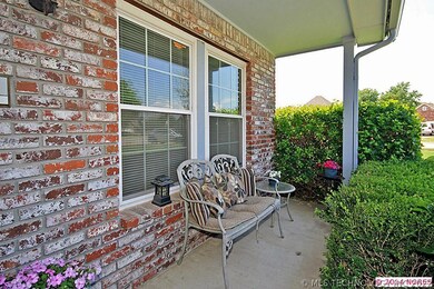 A large, covered front porch is one of 2 porch are