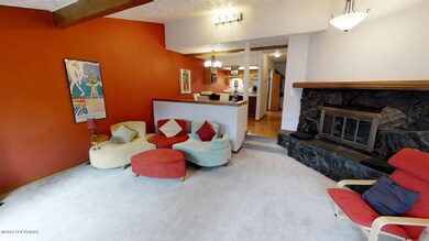 Living Room Opens to Dining and Kitchen