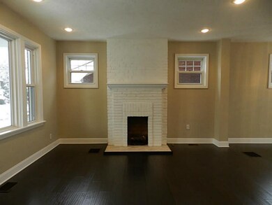 Living Room. Decorative fireplace with extensive r