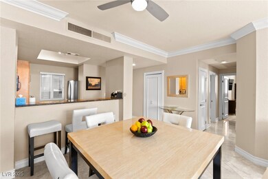Dining space with visible vents, baseboards, a cei