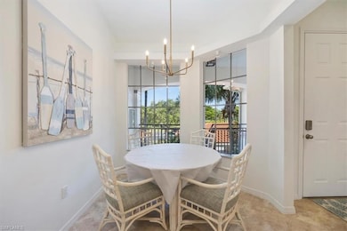 Cafe area featuring a chandelier and round table