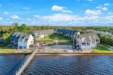 Aerial of community and pier