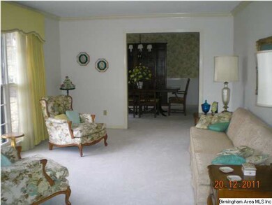 View from foyer into living room toward dining roo