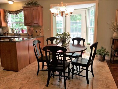Kitchen dinette with French doors that lead to dec
