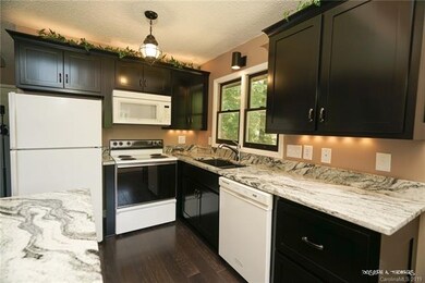 Look at this fabulous kitchen with granite