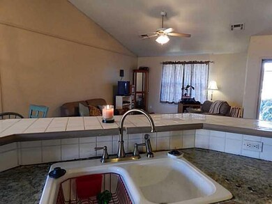 Kitchen. Kitchen over looking the living room!
