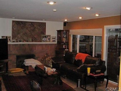 View of Family Room and Fireplace - Enclosed Patio
