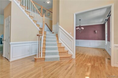 Another view of Foyer (dining room has been painted a neutral color since photos taken)
