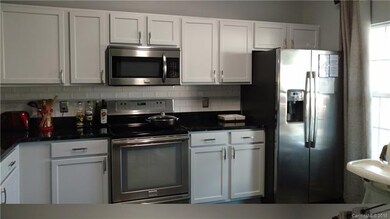 Additional view of kitchen ~ ample storage & count