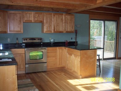 Kitchen and view of deck