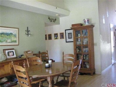 Another view of the dining area. Hallway leads to 
