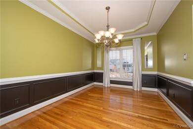 Formal dining with picture trim molding and trey c