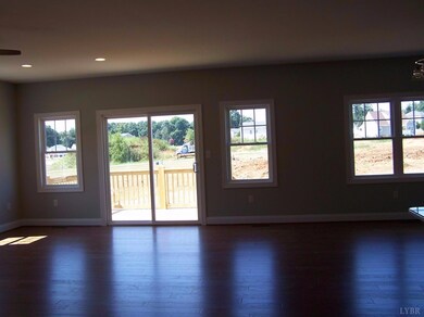 Great room rear view. Notice all the natural light