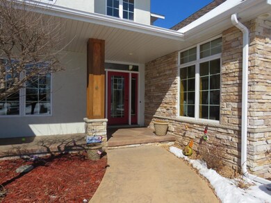 Attractive front entry, nicely landscaped to welco