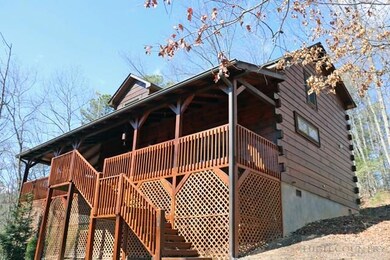 House Front: Front of house sits high to allow for better views but wrap around drive provides much lower access around back.