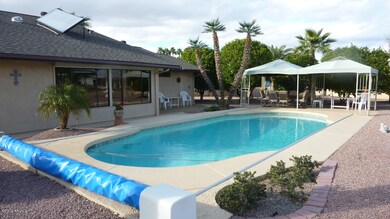 View of uncovered pool, gazebos