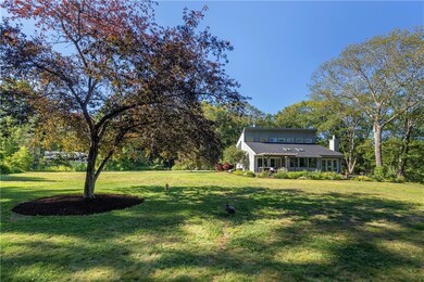 With almost 6.5 acres of lawn,...