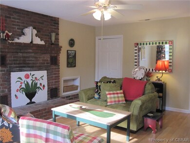 Family Room showing Brick Fireplace