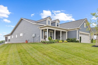 This stunning home features lush manicured landscaping