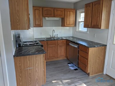 Remodeled kitchen - new counters, flooring, stainl