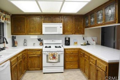 Roomy Kitchen, cabinets with decorative glass inse
