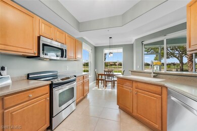 Kitchen with appliances with stainless steel finis