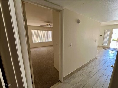 Hallway to 1st bedroom