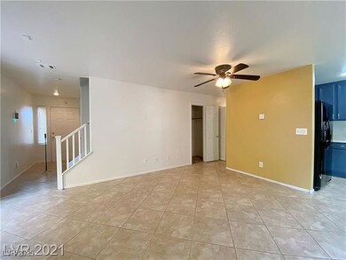 Unfurnished living room featuring stairs, a ceilin