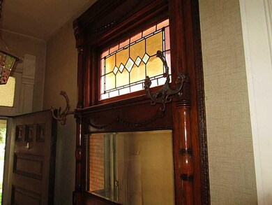 Entry/Foyer. Another view of the stained glass and