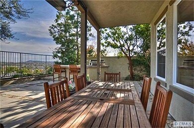 Backyard covered loggia  with built-in gas heaters