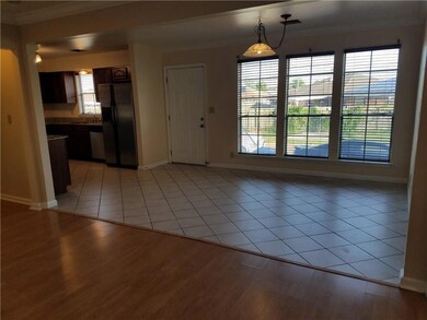 Living room view of kitchen and breakfast area